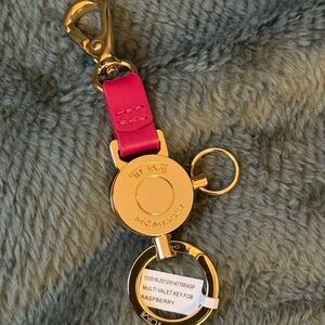Tumi Pink and Gold Key Holder